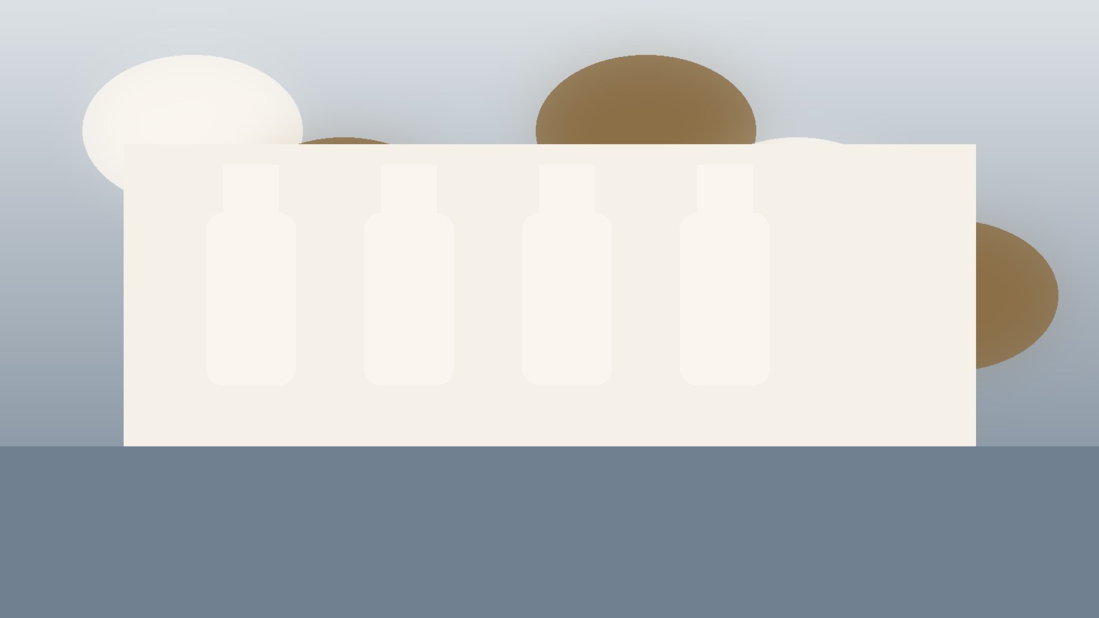Stylized sake tasting glasses overlooking a quiet rural brewery landscape